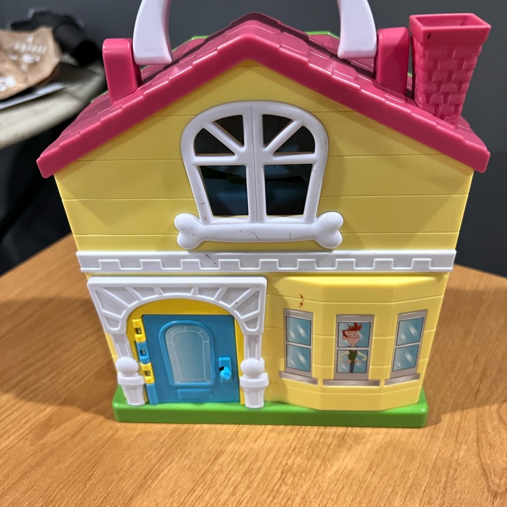 Yellow and Blue Playhouse with White Accents